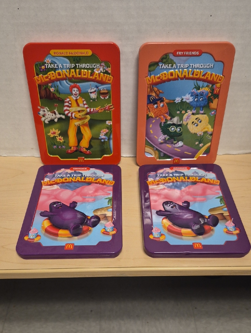Lot of 4 McDonald's The McDonaldLand Adult Happy Meal Tins 2025